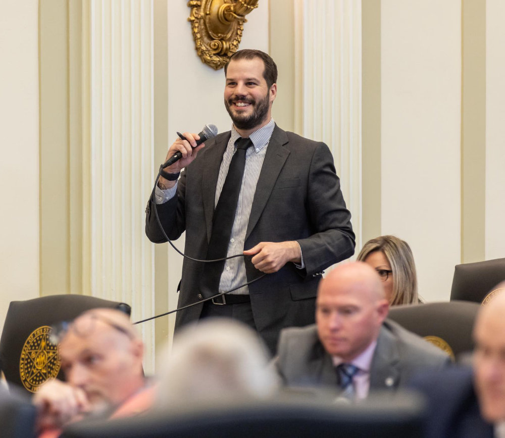 Gabe Woolley speaking on the House floor